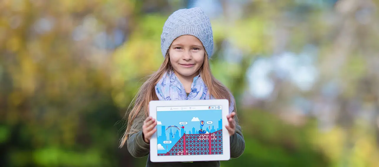Girl holding a tablet with Grafari app