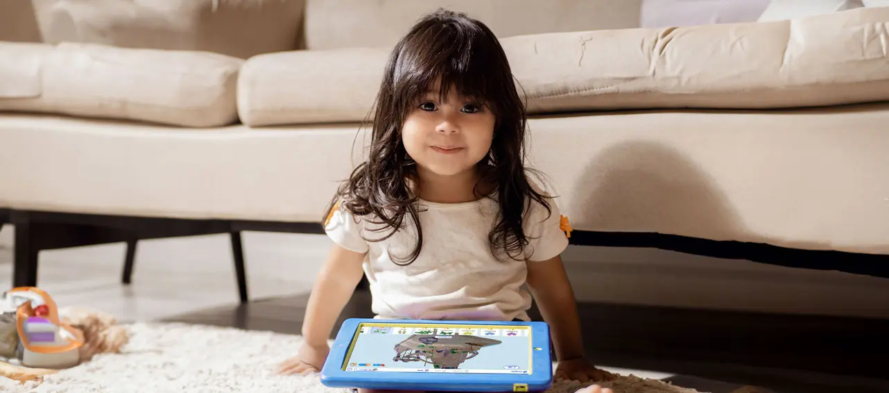 Girl holding a tablet with Grafari app