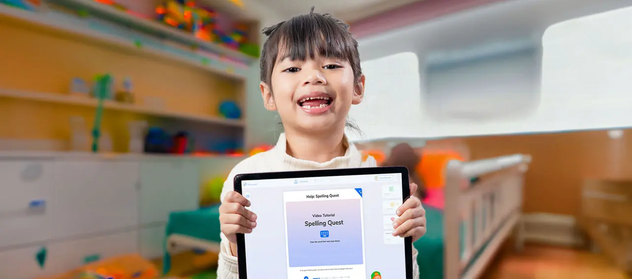 Girl holding a tablet with Grafari app