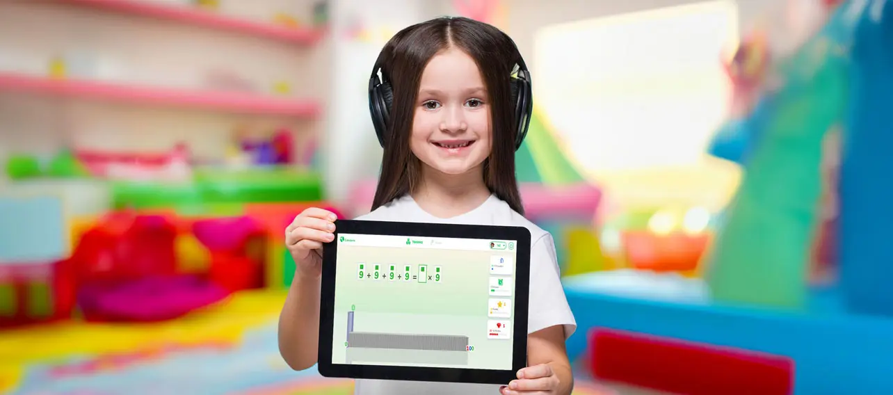 Kid holding tablet with open Calcularis app