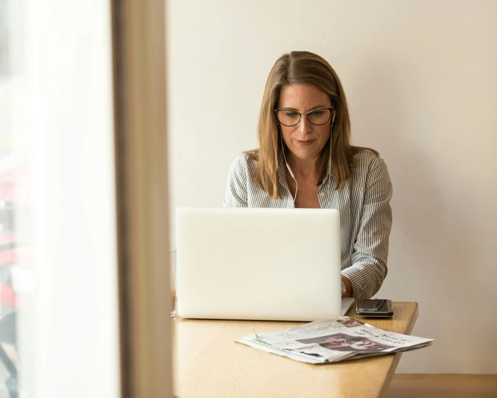 woman at desk - online certification 