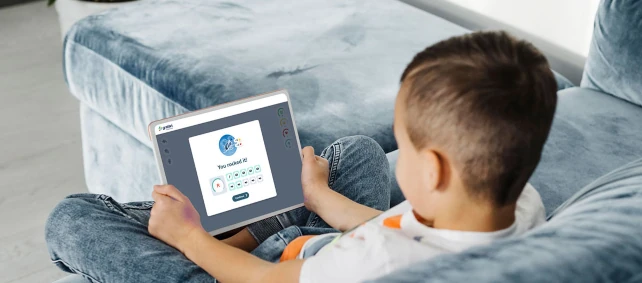 A child learning with Grafari on a tablet