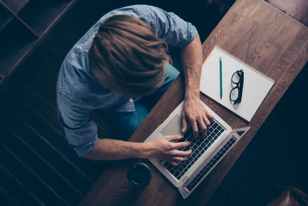 A man working on his laptop