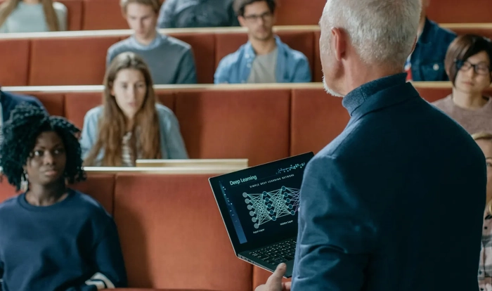 university hall with students and a teacher