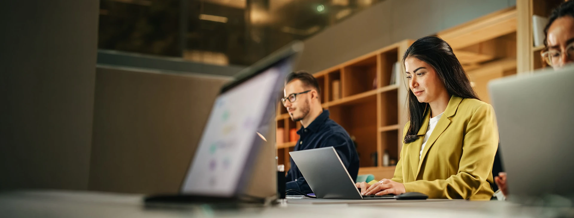 People in an office working at their desks