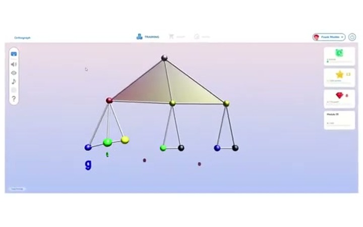 Grafari exercise showing a word built as a three-dimensional structure of colored spheres