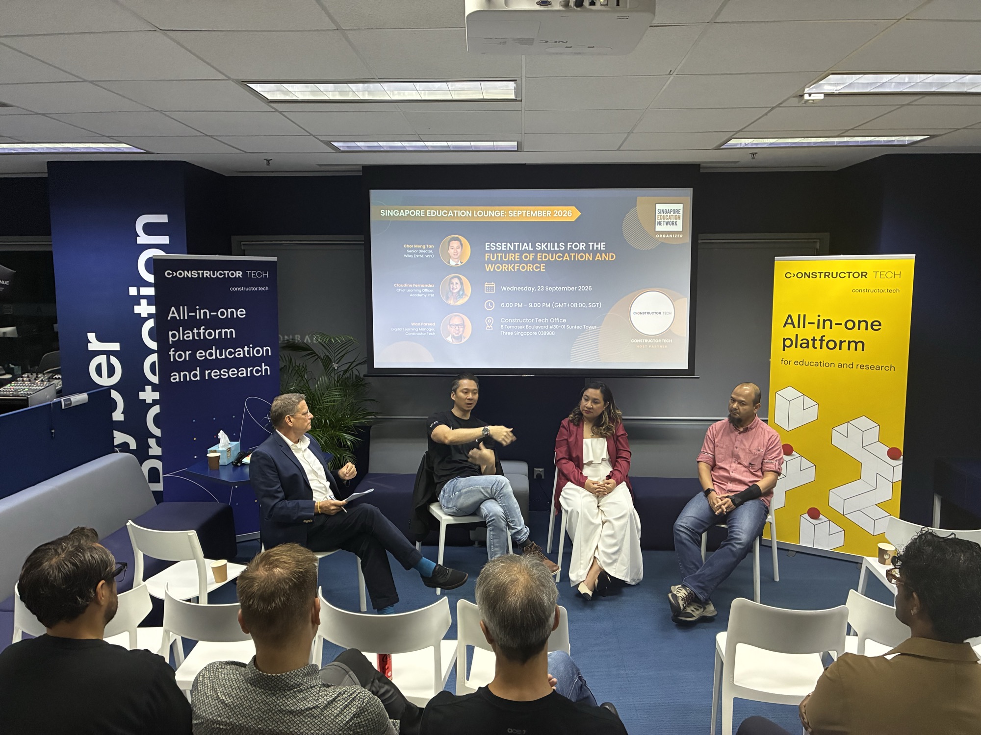 Alex Boome moderating the panel at the Singapore Education Lounge