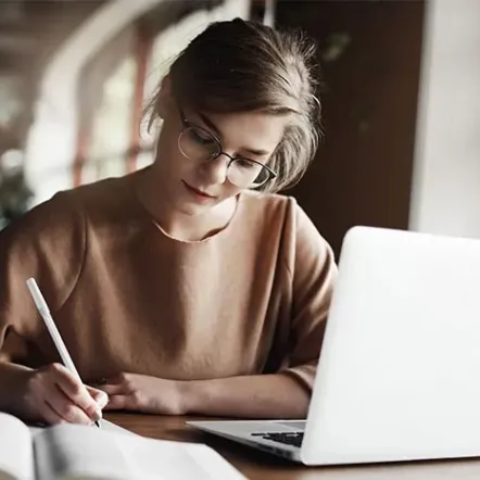 A woman using online proctor