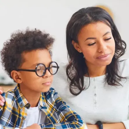 mother helping her son with studying using Grafari